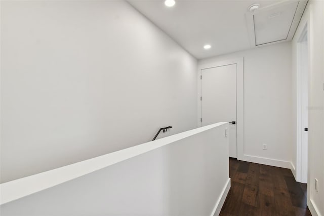 hallway with dark wood-type flooring