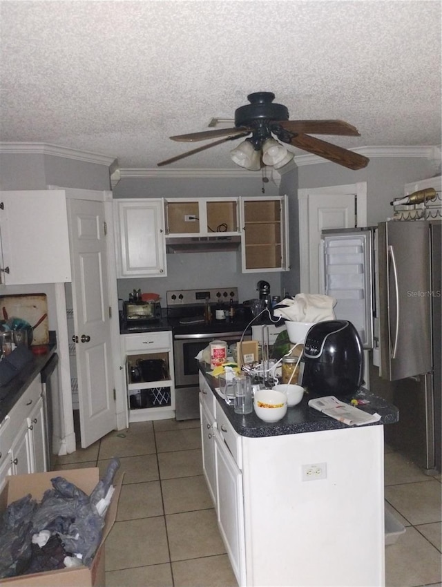 kitchen with white cabinets, ceiling fan, a kitchen island with sink, and appliances with stainless steel finishes