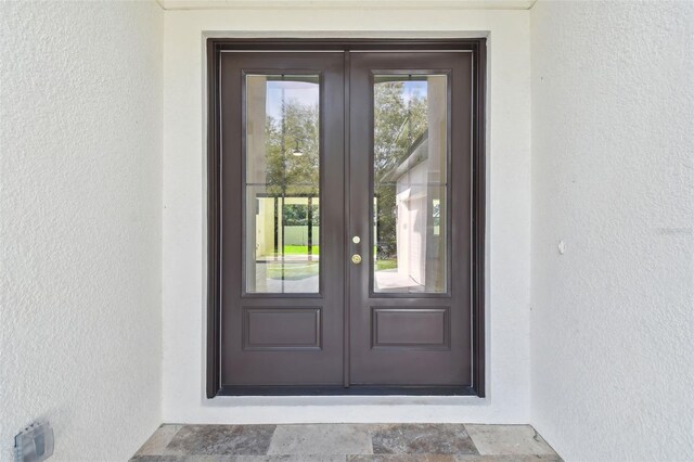 entrance to property with french doors