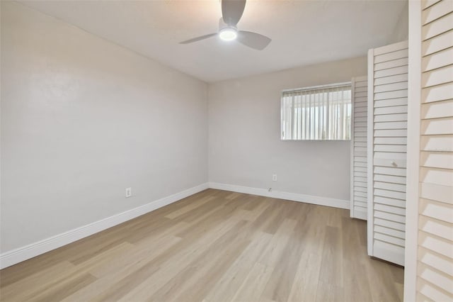 unfurnished room with ceiling fan and light wood-type flooring