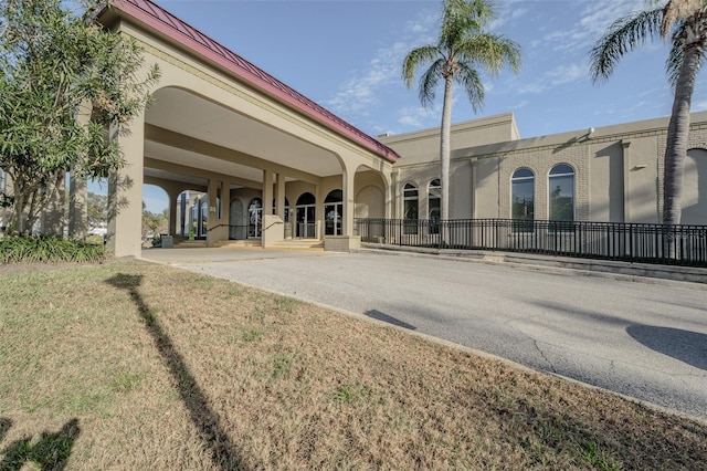 rear view of house with a yard