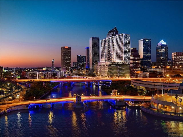 property's view of city featuring a water view