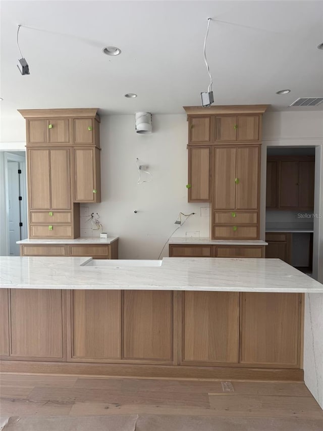 kitchen featuring hardwood / wood-style flooring