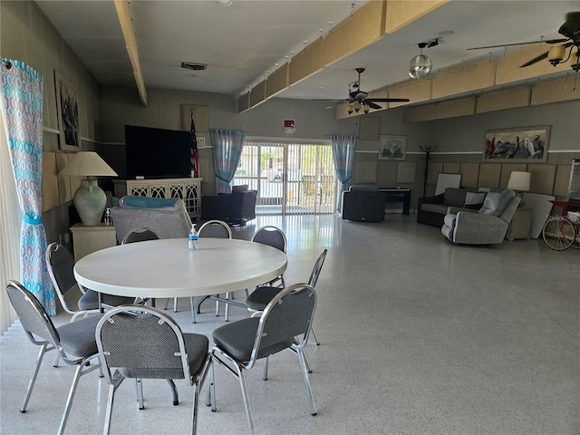 dining area with ceiling fan