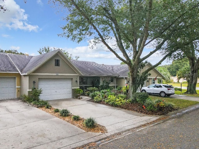 ranch-style house featuring a garage