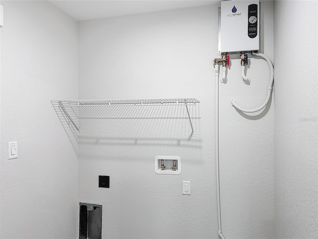 washroom featuring washer hookup and tankless water heater