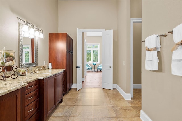 bathroom featuring tile patterned floors and vanity