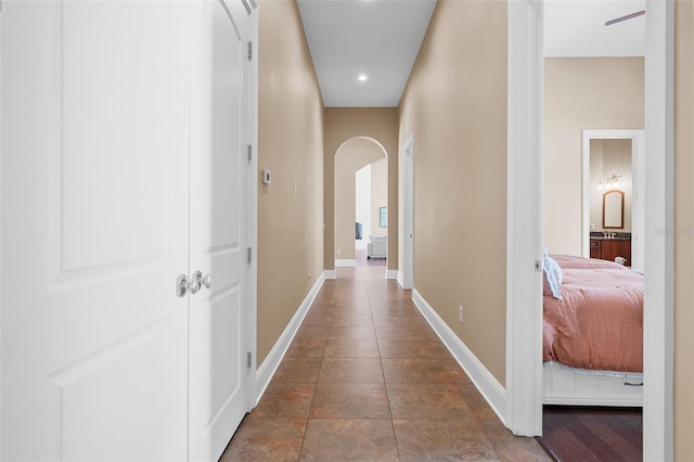 corridor featuring tile patterned flooring