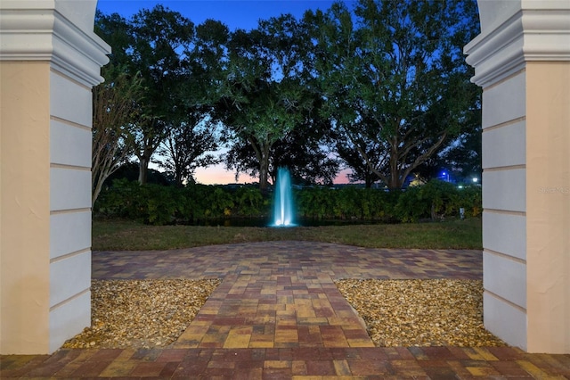 view of patio terrace at dusk