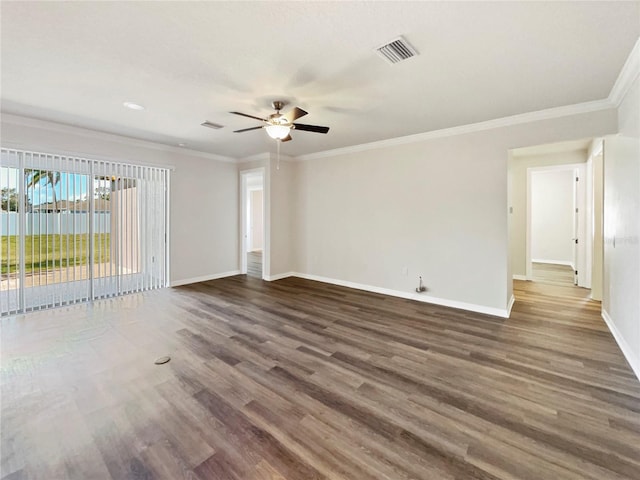 unfurnished room with ornamental molding, dark hardwood / wood-style floors, and ceiling fan