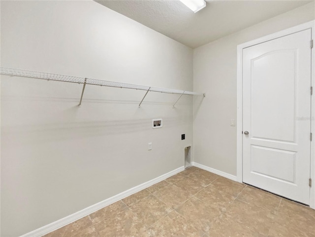 clothes washing area with washer hookup and hookup for an electric dryer