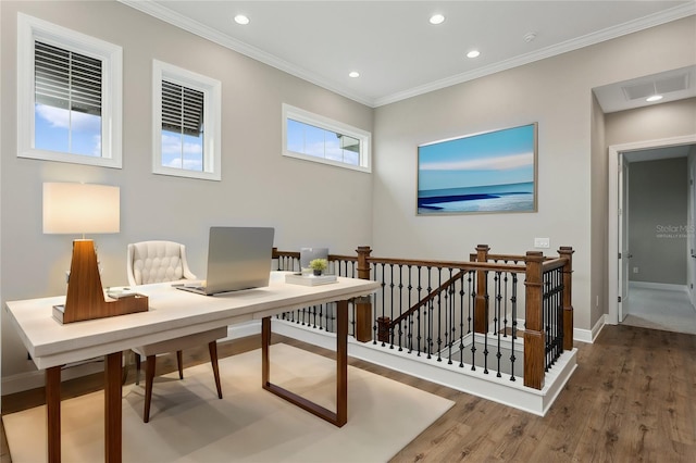 office area with wood-type flooring and ornamental molding