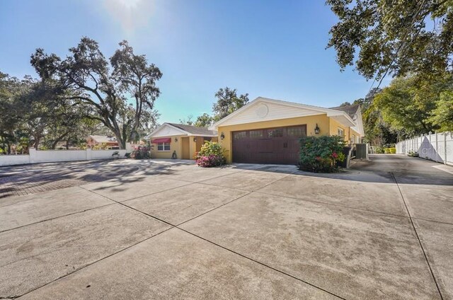 ranch-style home with a garage