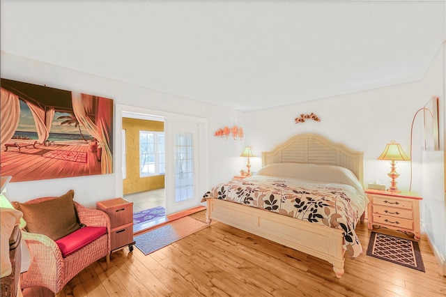 bedroom with light hardwood / wood-style flooring