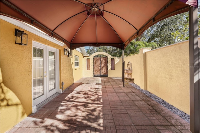 view of patio / terrace with a gazebo and french doors