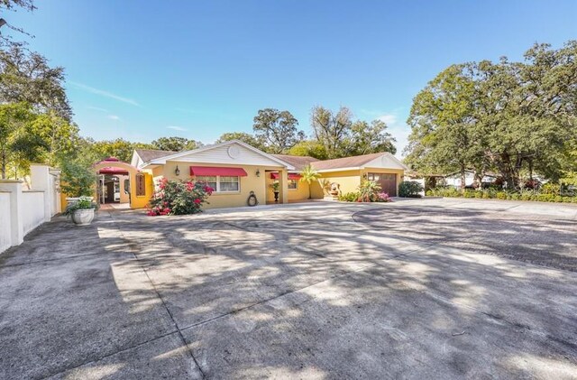 ranch-style house featuring a garage