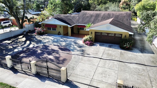 ranch-style house featuring a garage