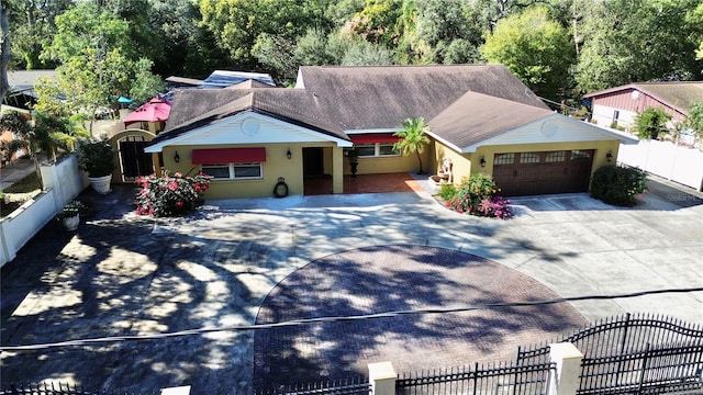 view of front of property featuring a garage