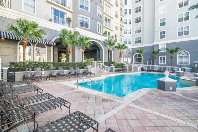 view of pool featuring a patio area