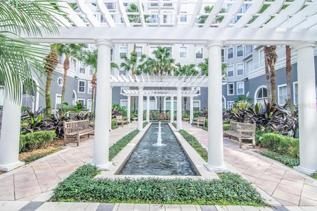 view of property's community with a pergola