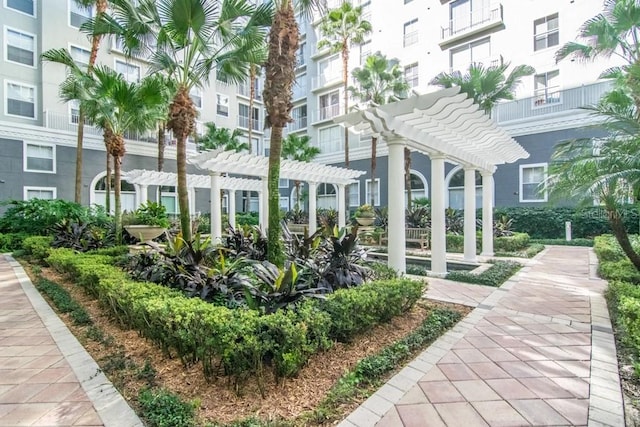 surrounding community featuring a pergola