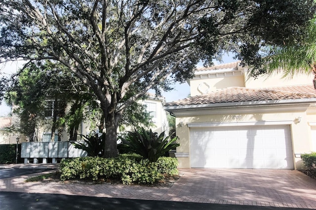 view of front of home with a garage