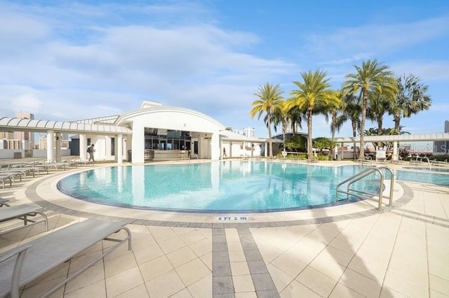 view of swimming pool featuring a patio