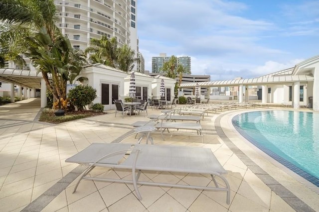 view of pool featuring a patio area