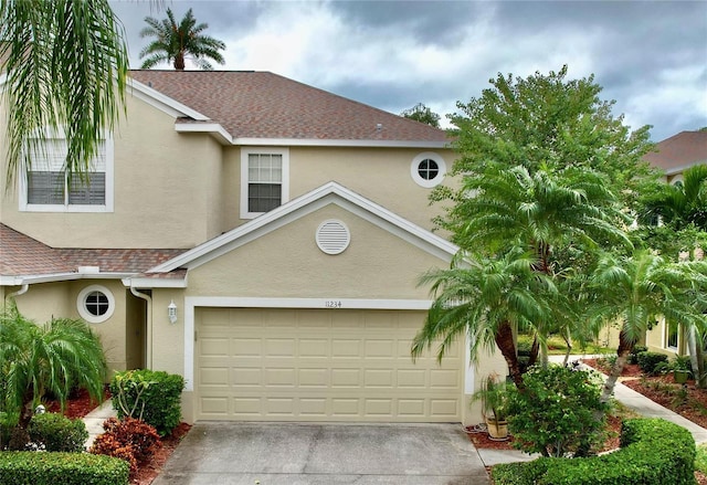 view of front of property with a garage