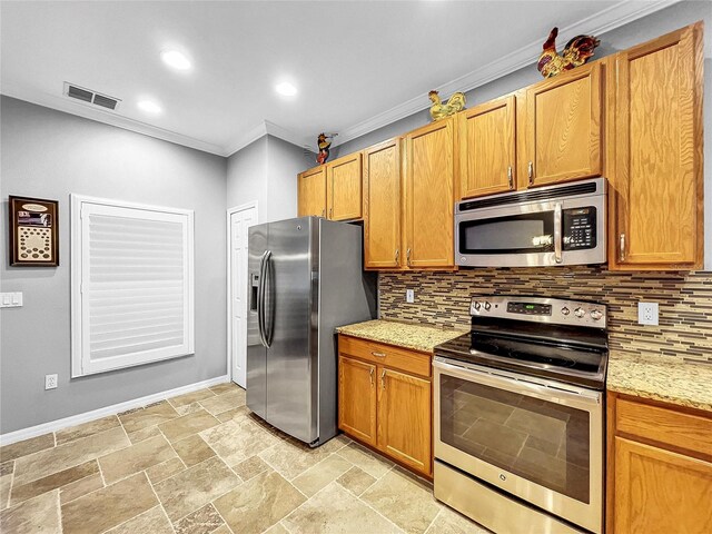 kitchen featuring decorative backsplash, appliances with stainless steel finishes, light stone counters, and ornamental molding