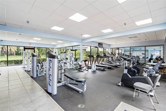 workout area with a drop ceiling