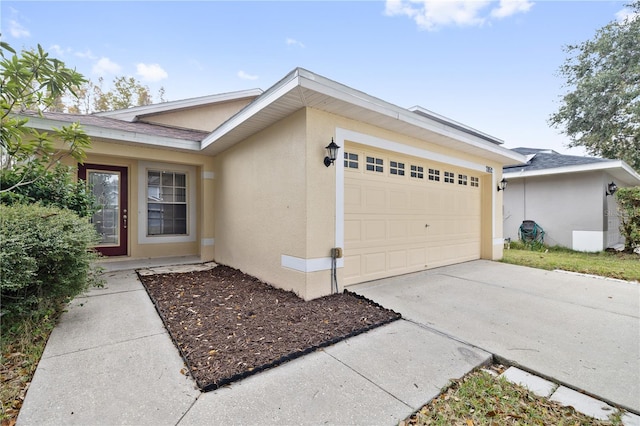 exterior space with a garage