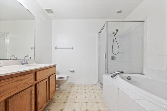 full bathroom featuring vanity, toilet, and independent shower and bath