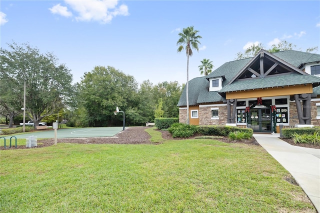 view of yard with basketball court