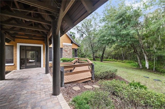 view of yard featuring a wooden deck