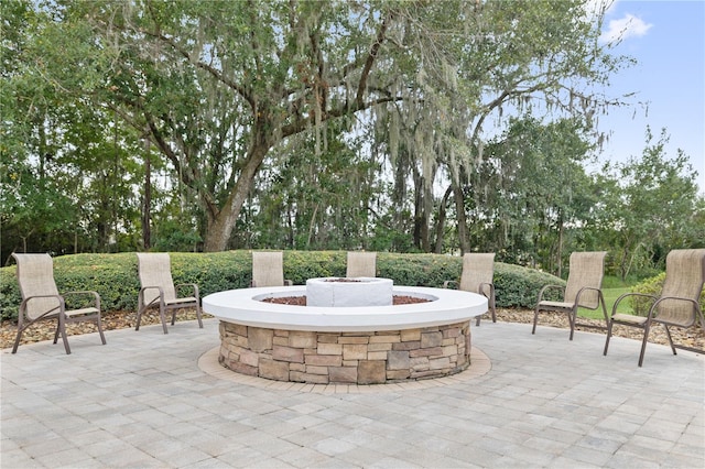 view of patio featuring a fire pit