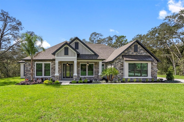 craftsman house with a front lawn