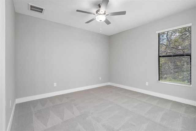 17059 Nokota Ave, Hudson, FL 34667 - carpeted spare room with a ceiling fan and baseboards