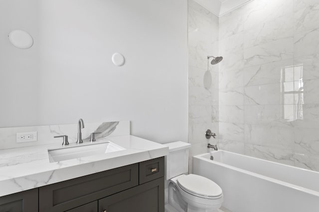 full bathroom featuring vanity, toilet, and tiled shower / bath combo
