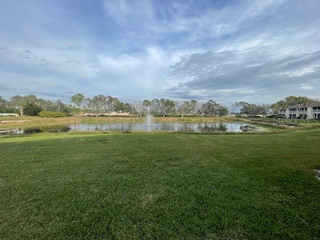 view of yard with a water view