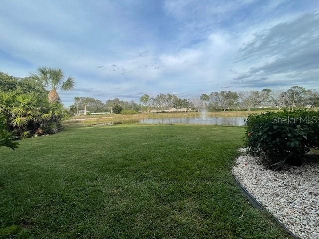 view of yard with a water view