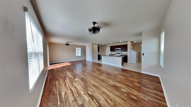 unfurnished living room with light hardwood / wood-style floors