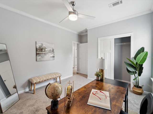 carpeted dining area featuring crown molding and ceiling fan