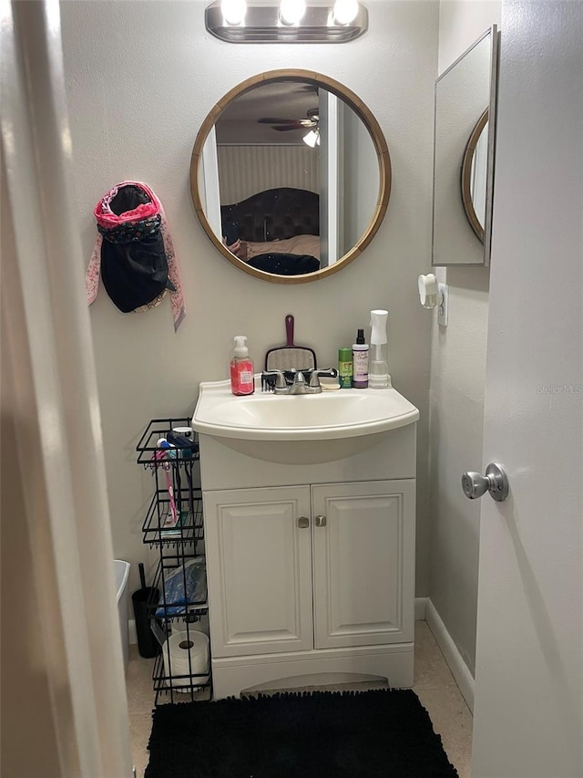 bathroom featuring vanity and ceiling fan