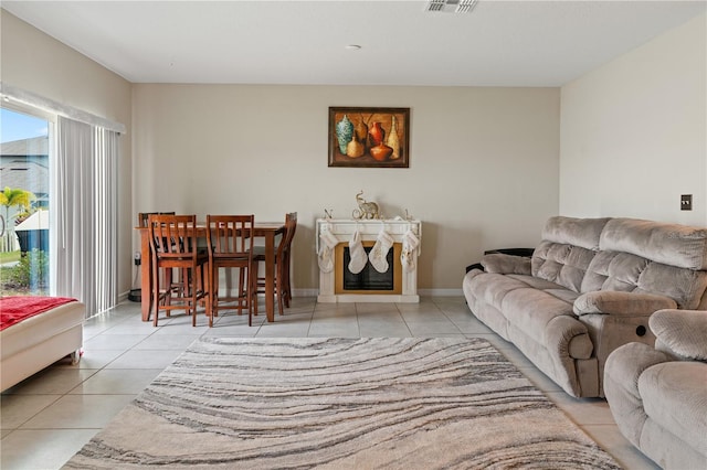 living room with light tile patterned flooring