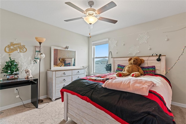 bedroom featuring ceiling fan and light colored carpet