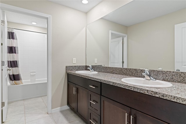 bathroom with shower / bath combination with curtain and vanity