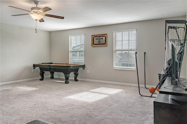 rec room featuring ceiling fan, carpet floors, a textured ceiling, and billiards