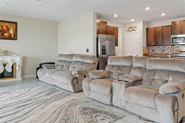 living room featuring light tile patterned floors