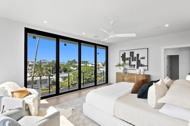 bedroom with access to outside, ceiling fan, and light hardwood / wood-style flooring